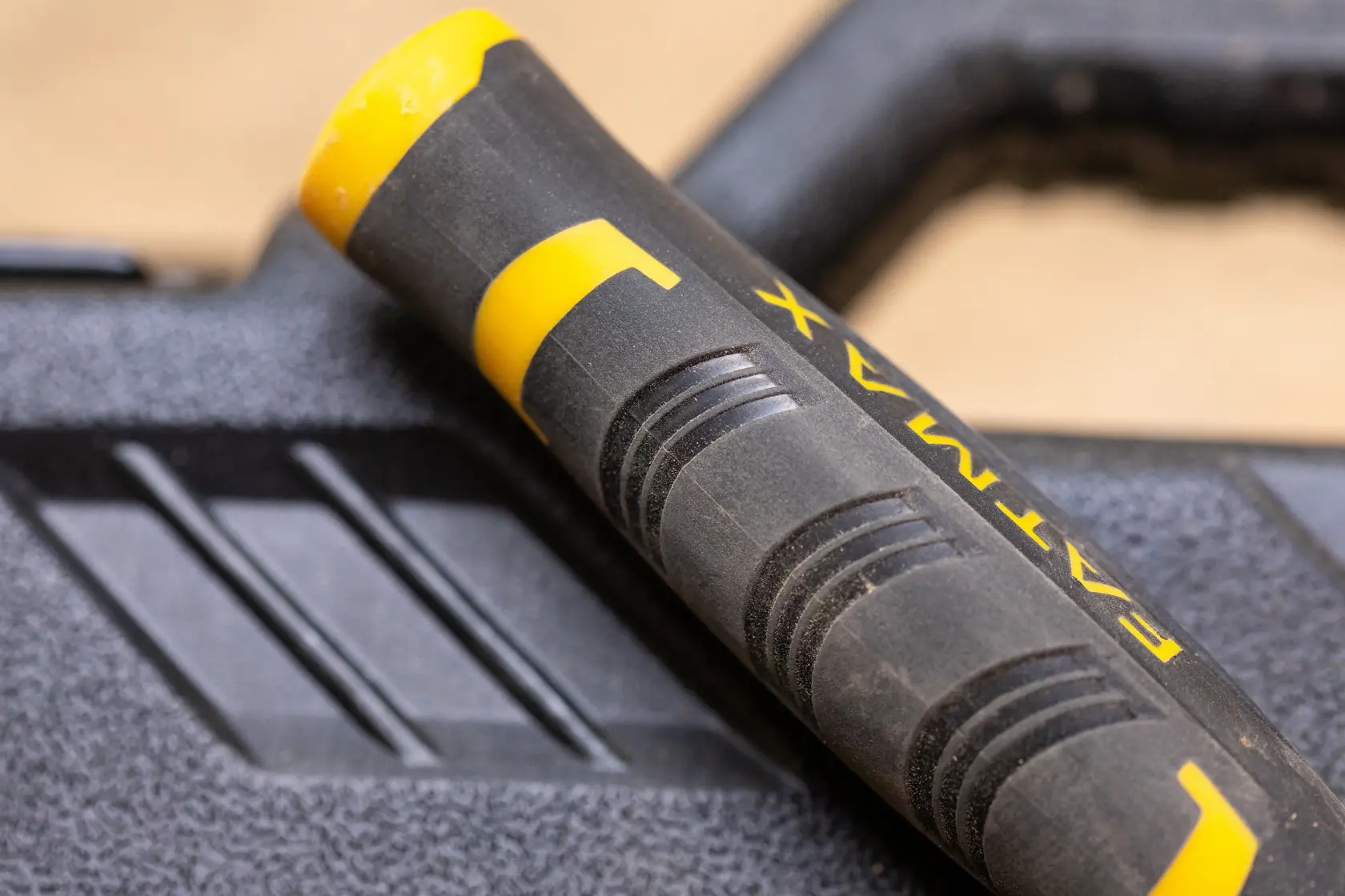 STANLEY FMMT82827-1 tool handle with textured black and yellow grip, close-up photography.