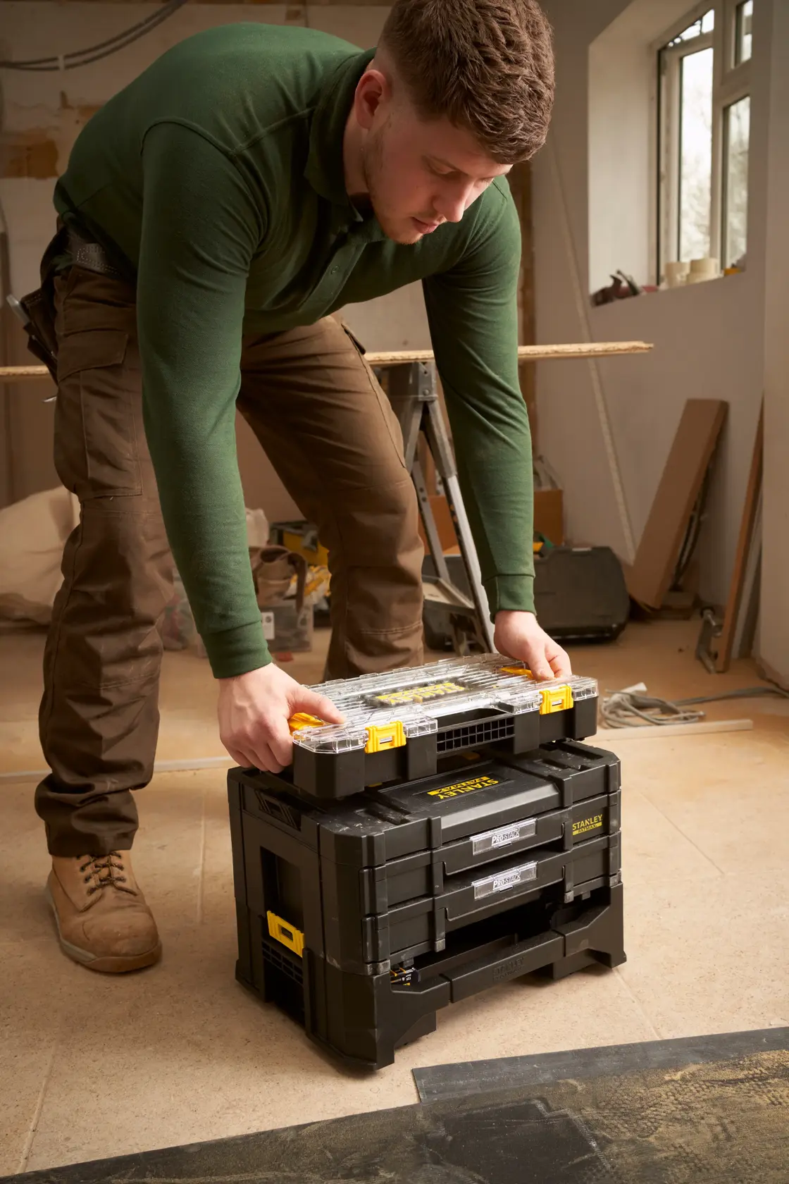 STANLEY FMMT98106-1 modular tool storage system in workshop, stacked with organizer box.